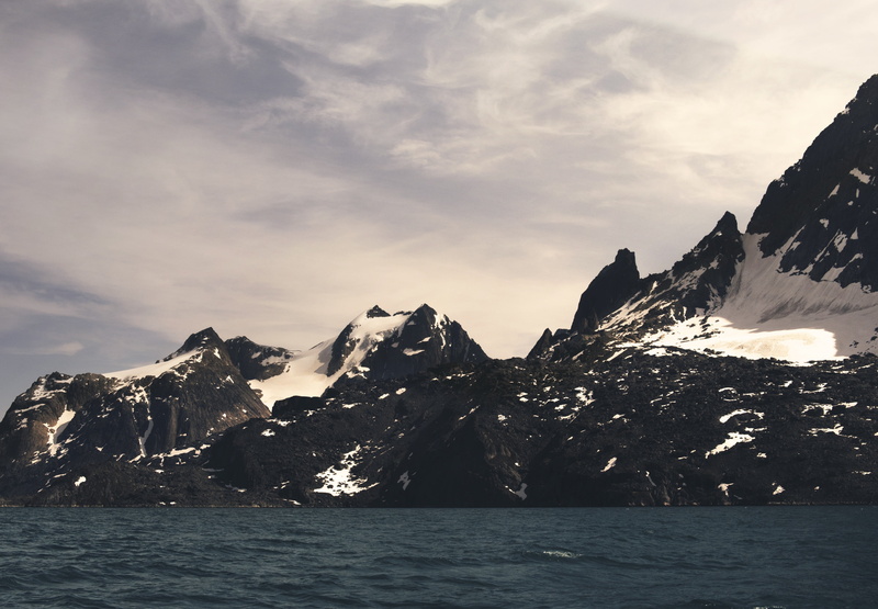 ocean, mountains, non-urban scene, winter, formation, covered, scenics - nature, outdoors, snowcapped mountain, environment, wild, waterfront, bluff, beauty in nature