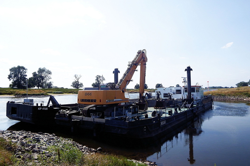 dredge the riverbed, outdoors, built structure, barge, fuel and power generation, armored tank, excavators, nautical vessel, mode of transportation, ship