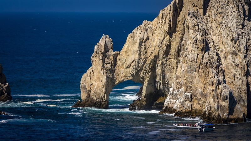arch, arco, day, sea, ocean, beauty in nature, rock formation, beach, horizon over water, water, land, sky, outdoors, rock - object, tranquility, cliff