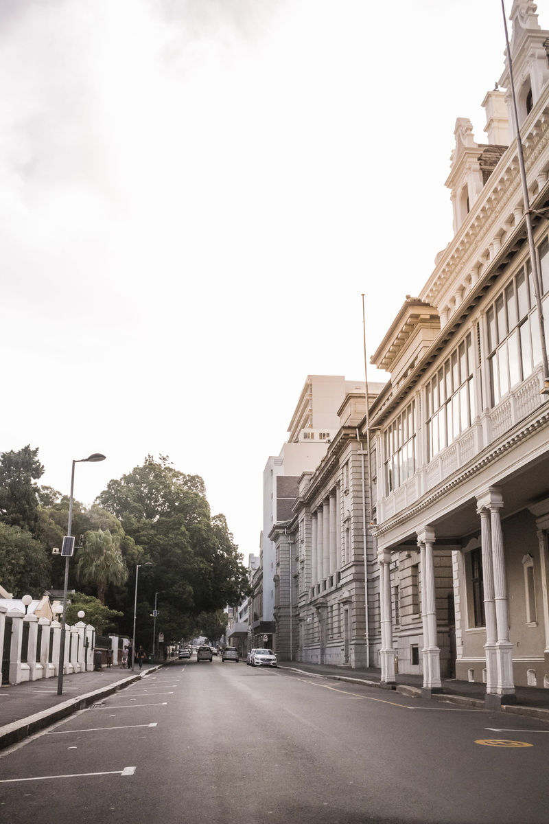 built structure, transportation, hipster, motor vehicle, building, sky, plant, cape town, mode of transportation, bright, light flare, car, road, sunset