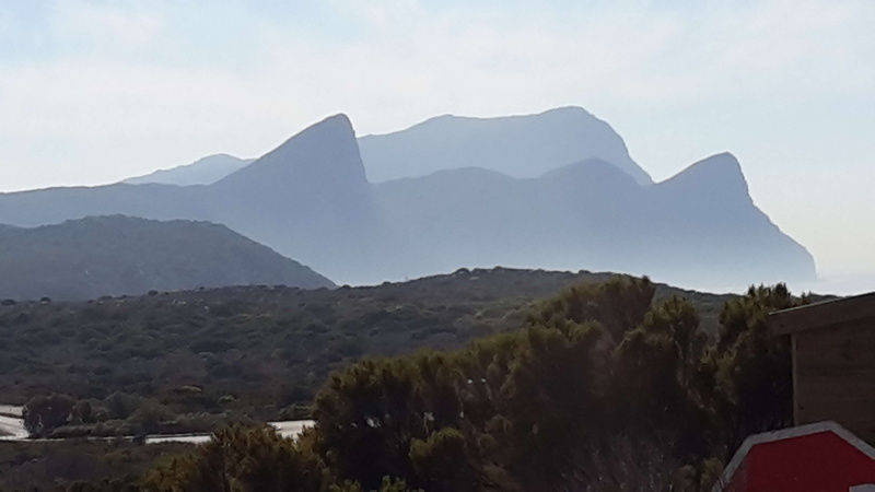 day, mountain, architecture, sky, tranquil scene, landscape, building exterior, no people, outdoors, environment, mountain range, plant, 2K, built structure