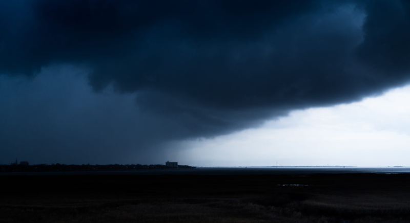 beauty in nature, thunderstorm, horizon, water, sky, outdoors, storm, scenics - nature, overcast, dramatic sky, no people, storm cloud, beach, land, power in nature
