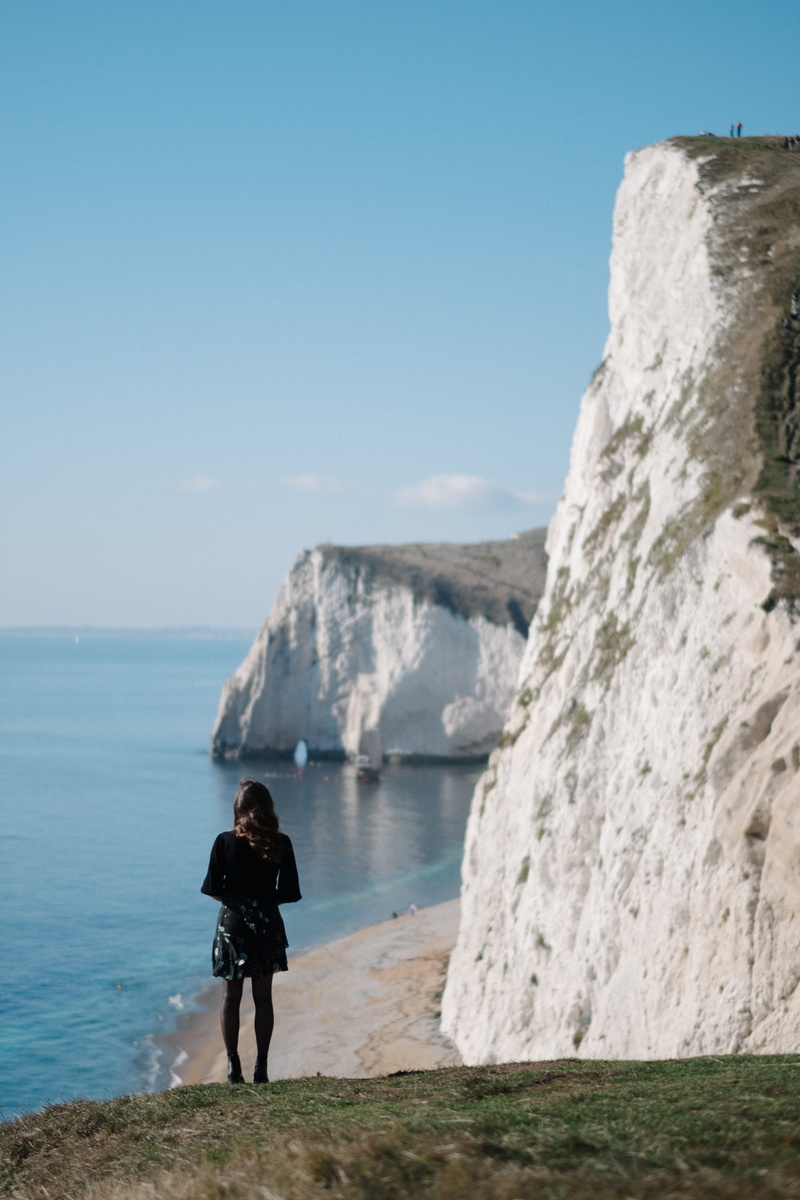 mountain, leisure activity, lifestyles, outdoors, ice, slope, water, united kingdom, one person, standing, scenics - nature, wareham, solid, sky, rock - object