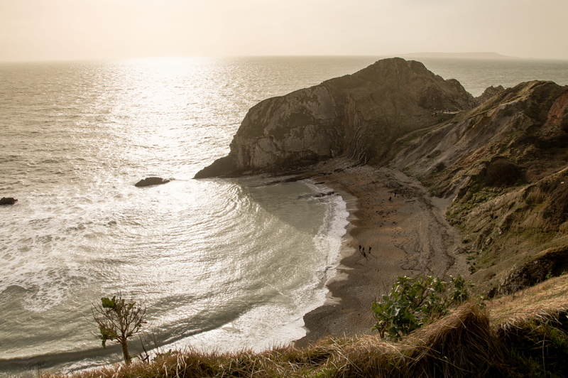 surfing, solid, united kingdom, seaside, water, sunset, tranquility, beach, rock formation, outdoors, sea, scenics - nature, cliff, bay, aquatic sport