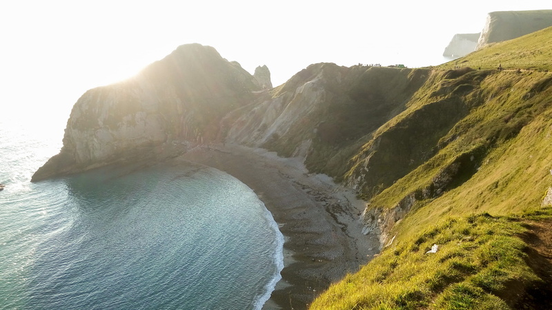 united kingdom, no people, day, rock formation, durdle door, scenics - nature, 2K, nature, rock, mountain, tranquility, idyllic, sunlight, wareham, lens flare