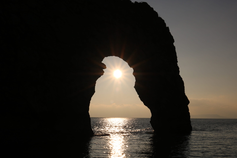 scenics - nature, lens flare, horizon over water, sunset, rock, durdle door, silhouette, wareham, sea, sun, horizon, water, no people, sky, nature, waterfront