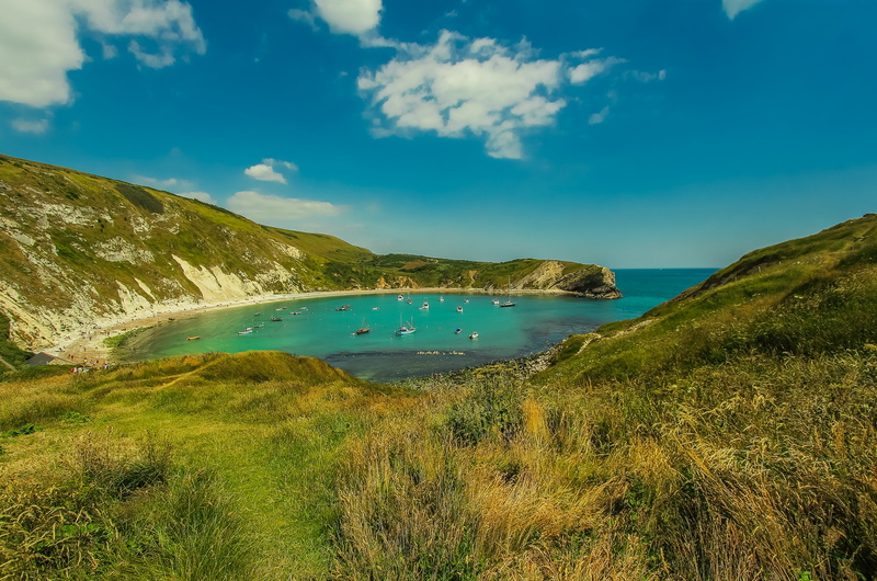 nature, lulworth cove, grass, beach, water, idyllic, non-urban scene, no people, 5K, mountain, outdoors, laguna, cloud - sky, ocean, tranquil scene, dorset