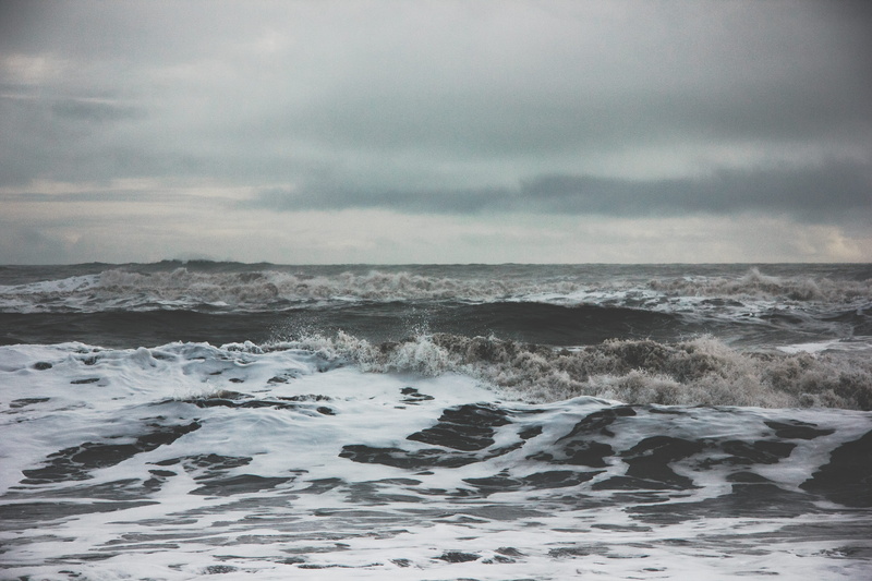 scenics - nature, cloud - sky, surfing, reynisfjara beach, motion, aquatic sport, outdoors, wave, water, horizon, land, power in nature, horizon over water