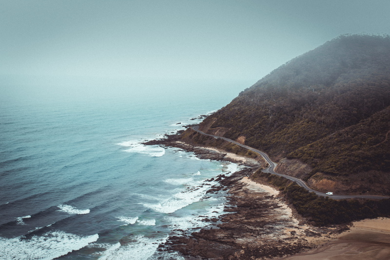 mountains, promontory, shoreline, ocean, mist, beside, non-urban scene, curve, sea, beauty in nature, australia, road, mountain, trees, rock, idyllic, coast