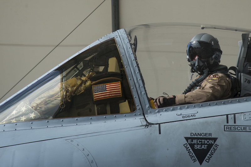 military, sitting, land vehicle, air force, air vehicle, Thunderbolt, A-10, aviation, outdoors, real people, a-10, uniform, helmet, jet, government, warthog