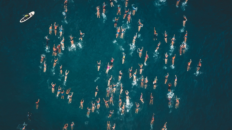 large group of people, sport, symbol, high angle view, fish, swimming, 2K, real people, land, human, person, sea, scenery, animal, brazil, beach, men