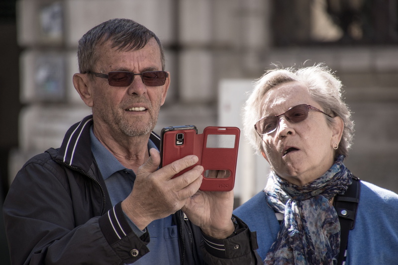 mobile phone, mature men, holding, tourists, adult, males, smartpgo, wireless technology, mobile, real people, iphone, smartphone, device, men, people