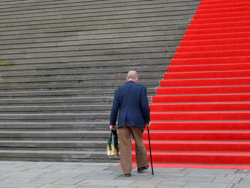 casual clothing, wall - building feature, lifestyles, real people, standing, outdoors, building exterior, stairs, men, city, old, walking, architecture