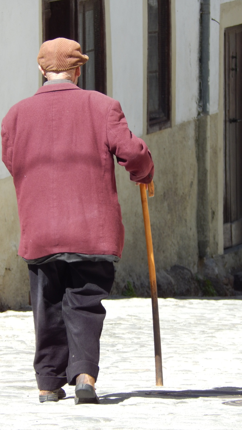 architecture, 4K, city, building exterior, walking cane, calendar, men, real people, one person, day, outdoors, rear view, clothing, built structure, warm clothing