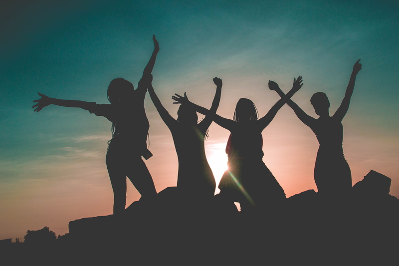 bonding, four, sky, lifestyles, sun, orange color, friendship, friends, girls, human arm, standing, sunrise, background, leisure activity, nature, sunset