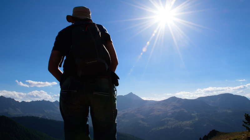 woman, rear view, sun, alps, vacations, silhouette, route, sunbeam, outdoors, one person, mountain, against the light, mountain range, hiking, sky, sunlight