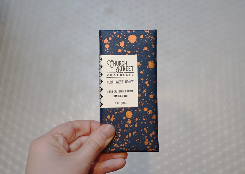 northwest, church street, communication, one person, northwest honey, unrecognizable person, chocolate, dark, bronze, holding, united states, paper, personal perspective