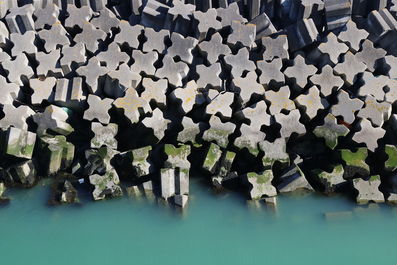 rock, wall - building feature, nature, still life, day, france, grey, ocean, shore, repetition, block, concrete, game, sea, pile, rubble, jigsaw puzzle
