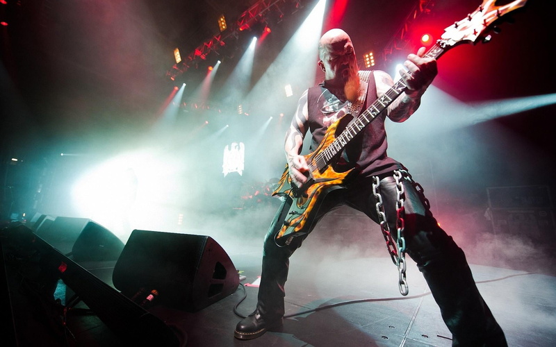 s, modern rock, pants, plucking an instrument, popular music concert, stage, skill, electric guitar, artist, guitar, stage light, Music, stage - performance space