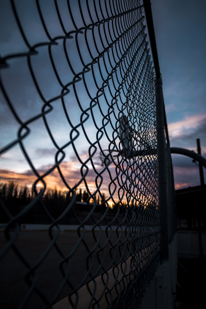 pattern, basketball, clouds, built structure, orange, barrier, security, sky, pink, boundary, united states, land, safety, basketball hoop, day, metal