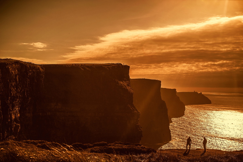 cliff, water, cloud - sky, no people, solid, tranquil scene, rock, stack rock, sunset, ocean, scenic, tourism, ireland, landscape, sunlight, scenics - nature