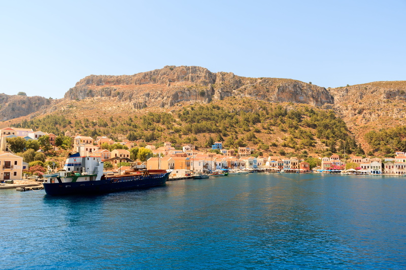 bay, boat, travel, transportation, blue, greece, mountain, water, kastellorizo, harbor, island, coast, sky, beach, beauty in nature, scenics - nature, mode of transportation