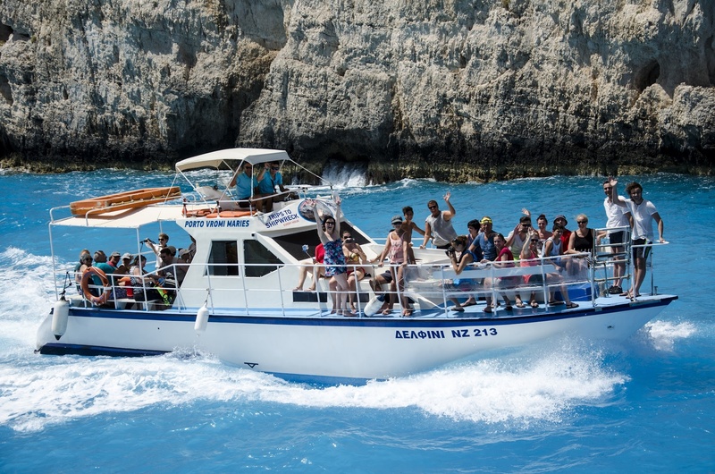 large group of people, island, real people, men, mode of transportation, transportation, nature, zante, ocean, turquoise, travel, greek, outdoors, landscape