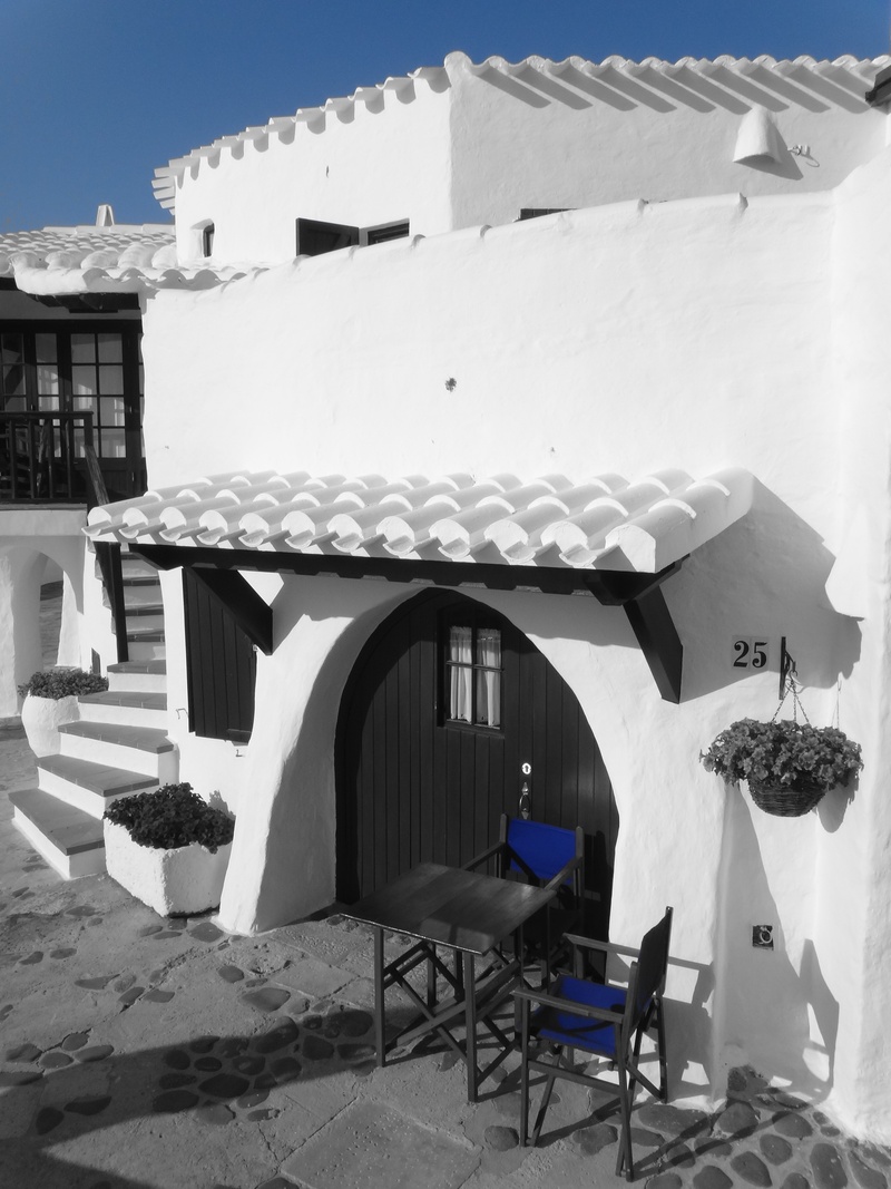 outdoors, built structure, house, flair, blue, village, architecture, sidewalk cafe, alley, black, black and white, snow, building, white color, day, mediterranean