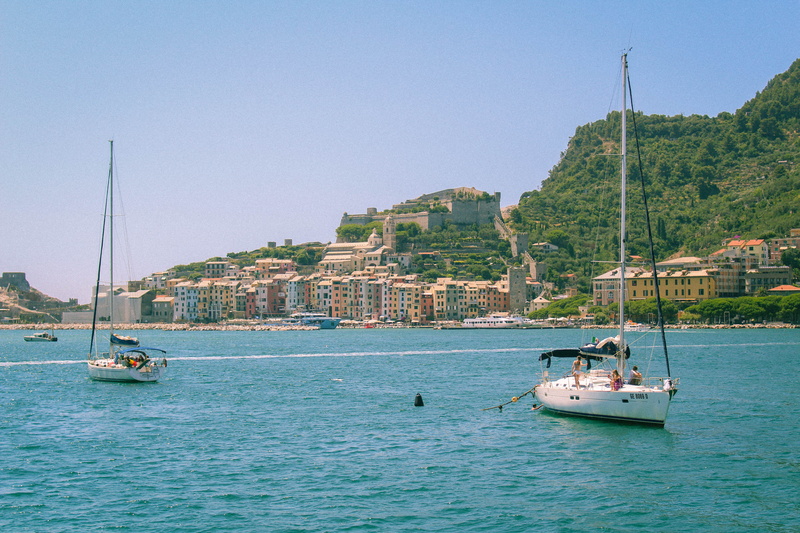 italy, building, sea, green, waterfront, travel, sailboat, day, mode of transportation, portevenere, colours, sailing, built structure, no people, building exterior