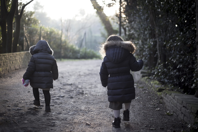 women, hood - clothing, people, parco miralfiore, outdoors, child, bonding, innocence, walking, lifestyles, full length, children, leisure activity, italy