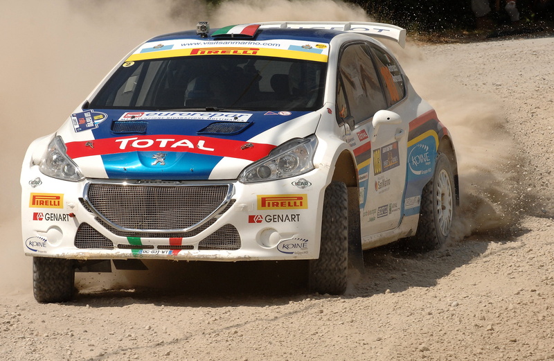 day, outdoors, machine, racing car, land vehicle, transportation, communication, number, sardinia, stationary, street, sand, road, single seater, competition