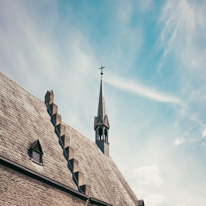 cloud - sky, belief, day, castle, nature, spirituality, vianden castle, low angle view, building exterior, roof tile, outdoors, spire, cross, blue, religion