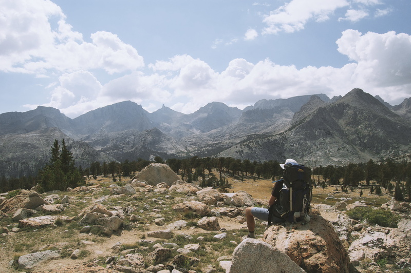 hike, mountain, rear view, adventure, lifestyles, men, adult, one person, non-urban scene, male, sky, rock, mountains, real people, beauty in nature, cloud - sky