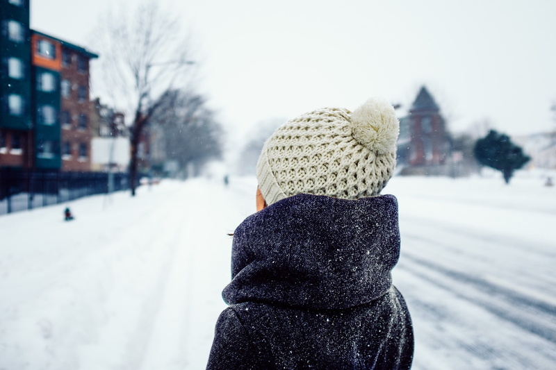 person, lifestyles, scarf, road, people, architecture, cap, covered, extreme weather, rear view, season, focus on foreground, hood - clothing, coat, clothing