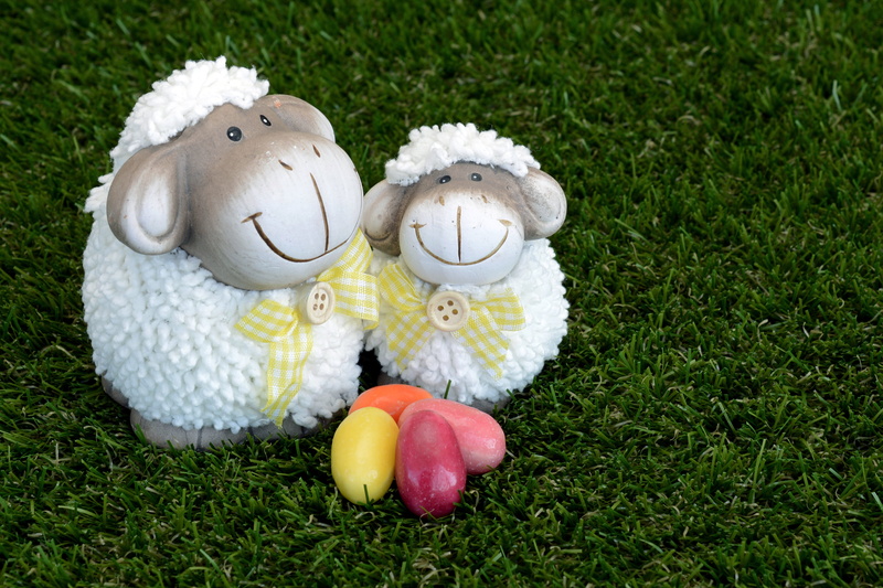 outdoors, group of objects, yellow, easter greetings, green color, two, spring, field, sugar eggs, easter celebration, creativity, no people, easter decoration