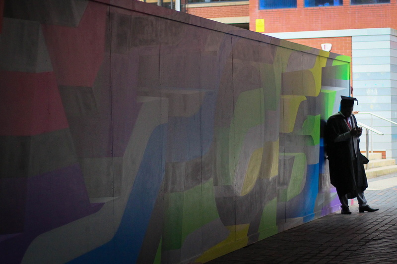 casual clothing, standing, creativity, 2K, mobile, adult, united kingdom, art and craft, wall, architecture, rear view, uni, wall - building feature, sheffield
