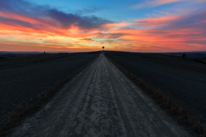 orange color, blue, cloud - sky, sunlight, dark, dirt road, beauty in nature, sky, road, landscape, sunset, 2K, nature, the way forward, scenics - nature