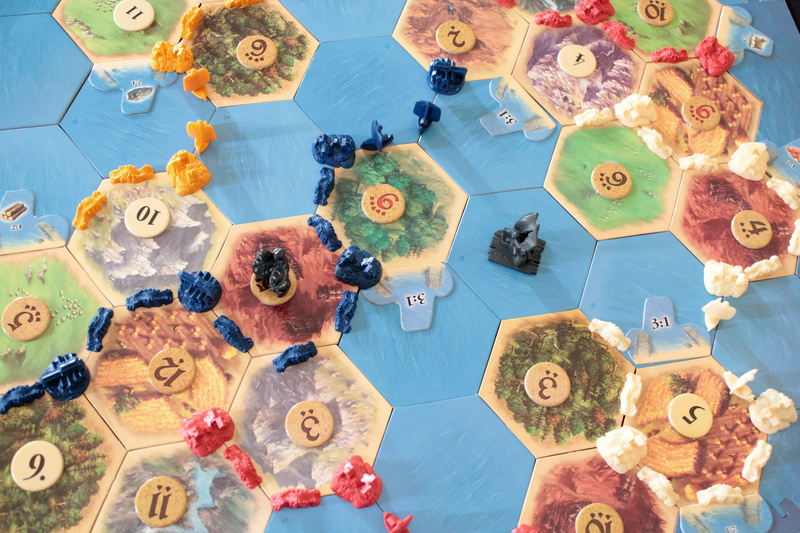 catan, toy, fruit, large group of objects, no people, apparel, clothing, food and drink, freshness, nature, building, indoors, board game, photo, pattern