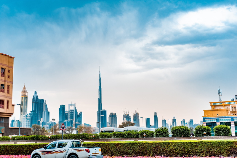 outdoors, dubai, cityscape, mode of transportation, tall - high, office building exterior, motor vehicle, metropolis, no people, emirates, built structure
