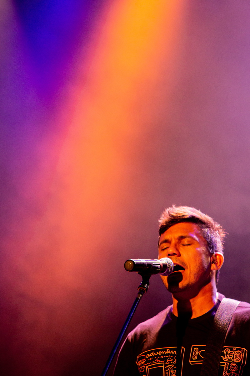 looking away, colorful, music, looking, rainbow colors, festival, soul, enjoyment, low angle view, singing, stage, musician, nightlife, input device, performance