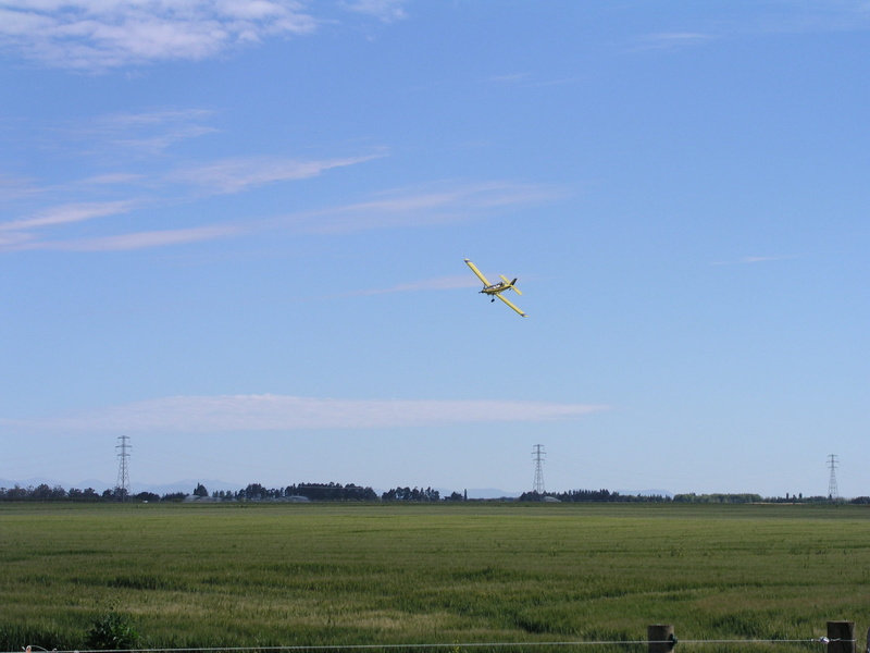 blue, plane, grass, day, air vehicle, mode of transportation, agricultural, outdoors, farming, plant, equipment, flying, agriculture, airplane, mid-air