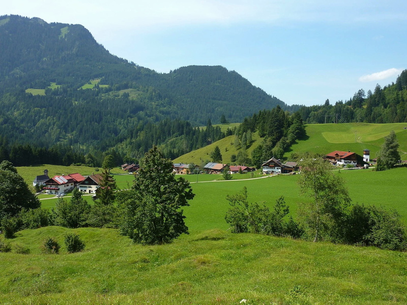 homes, built structure, hinterstein, outdoors, countryside, building, village, meadow, field, clouds, growth, sky, spring, beauty in nature, non-Urban Scene