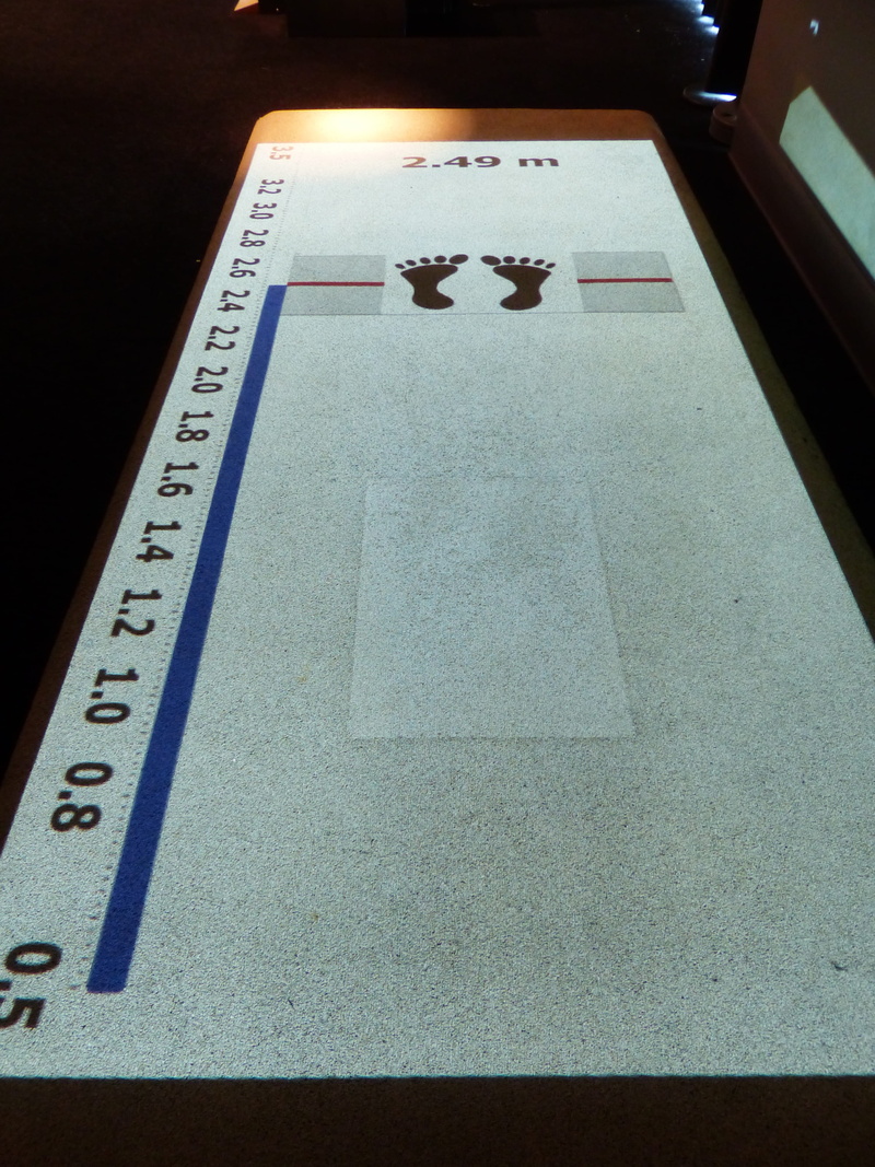 non-western script, indoors, no people, Long Jump, day, information, number, athletics, message, Measurement, script, sportsmanship, meter, text, film industry