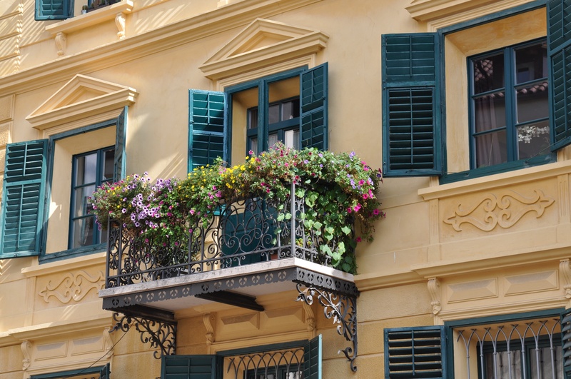 south tyrol, balcon, residential district, built structure, city, metal, no people, low angle view, window box, day, railing, flowers, potted plant, shutter