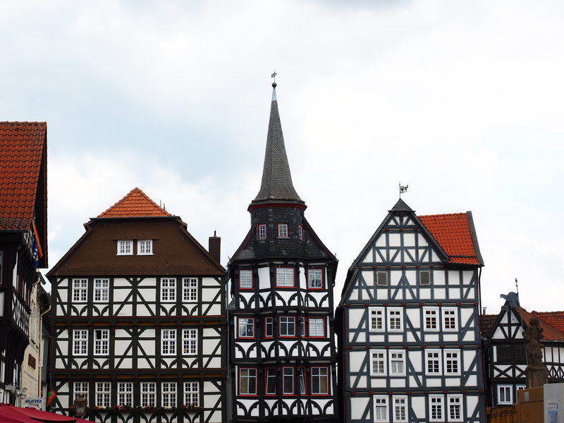 cloud - sky, day, fachwerkhäuser, the past, place of worship, spire, center, built structure, row house, marketplace, downtown, tower, city, cathedral city