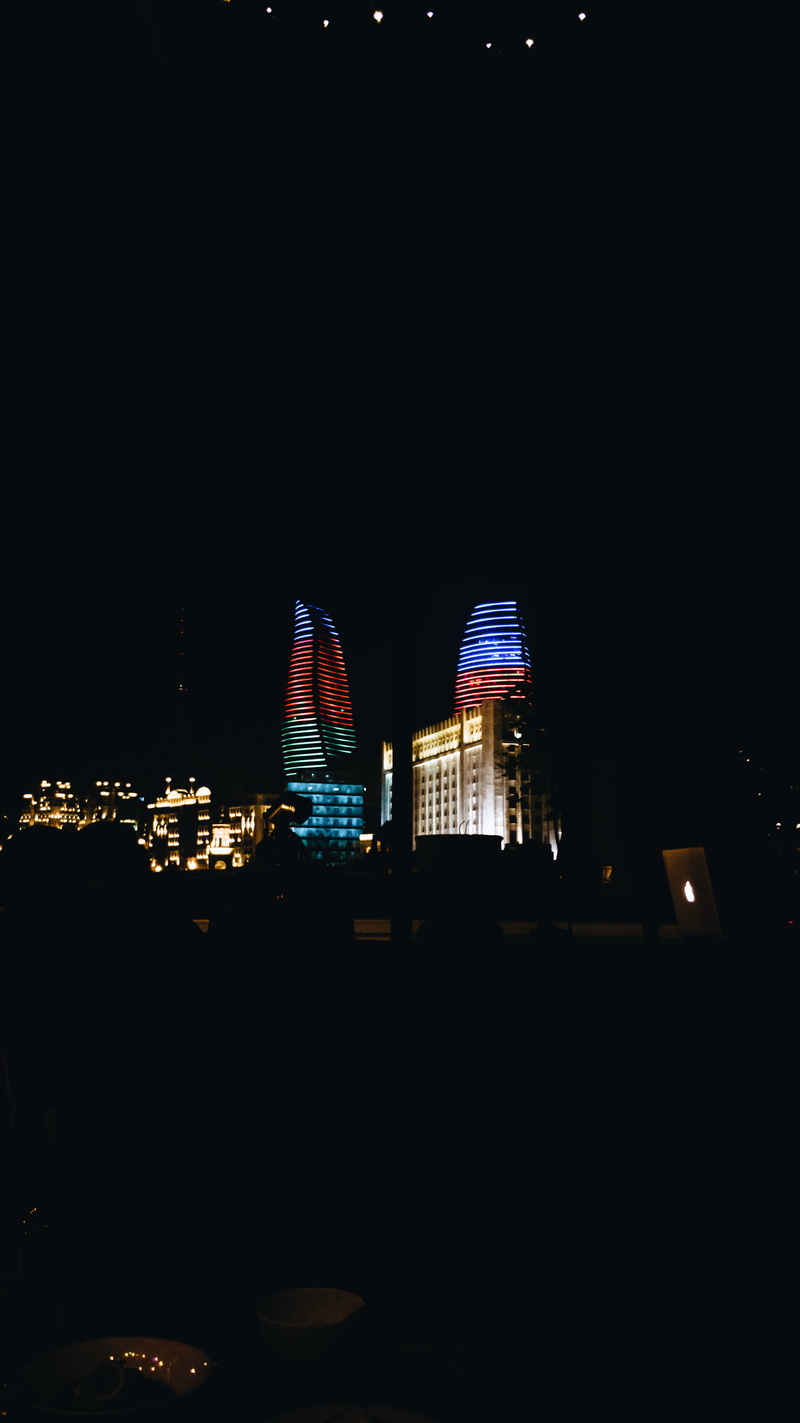 illuminated, no people, office building, downtown, building, tourism, dark, asphalt, flametowers, nightlife, night, architecture, high rise, azerbaijan