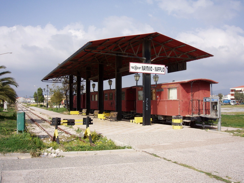 road, red, architecture, text, train station, railroad, building Exterior, train, footpath, communication, cloud - sky, photos, sky, station, Greece, transportation
