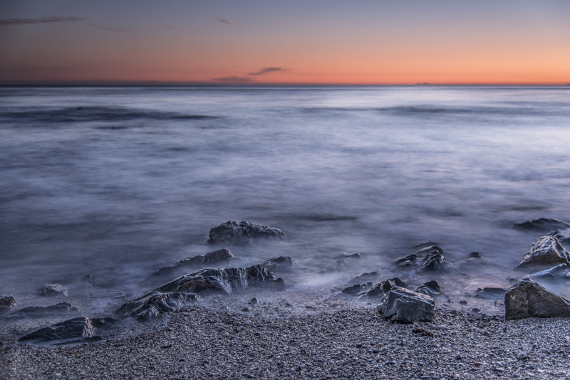 rock, tranquil scene, waves, power in nature, marina, mijas, sea, sun, horizon over water, outdoors, costa del sol, beach, long exposure, peaceful, horizon