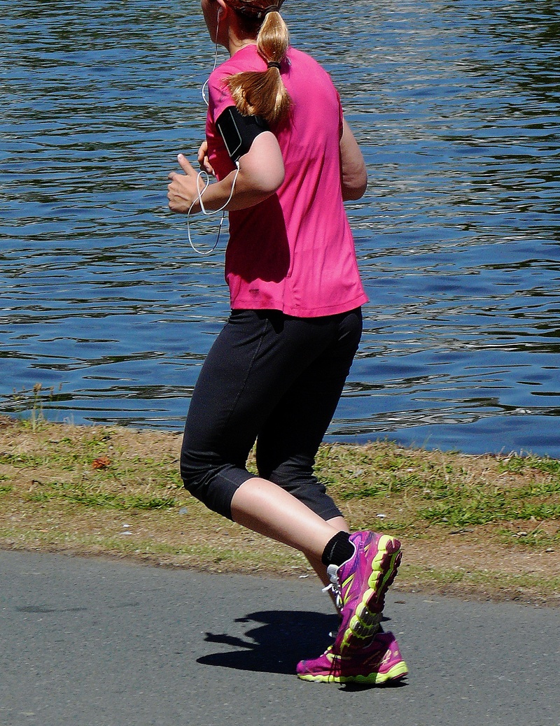 pink color, lifestyles, park, standing, continuous operation, nature, run, women, females, full length, body, day, summer, leisure activity, near, rear view