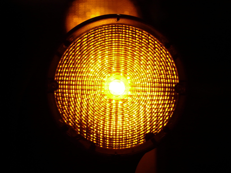 yellow, black background, glowing, nightlife, warning, circle, construction site lighting, electric lamp, light source, dark, night, geometric shape, electricity